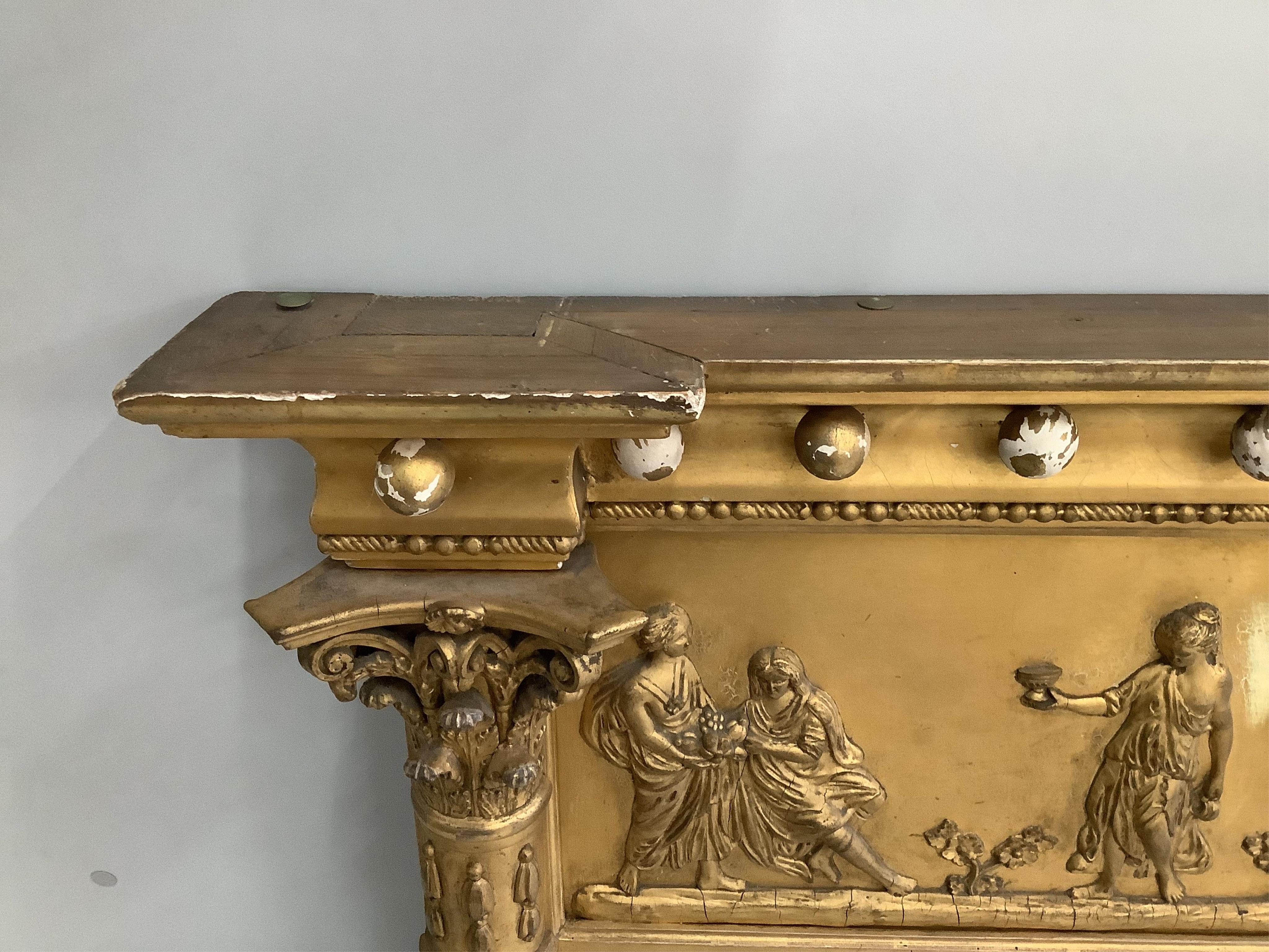 A Regency giltwood and composition triple plate overmantel mirror, width 148cm, height 90cm. Condition - fair